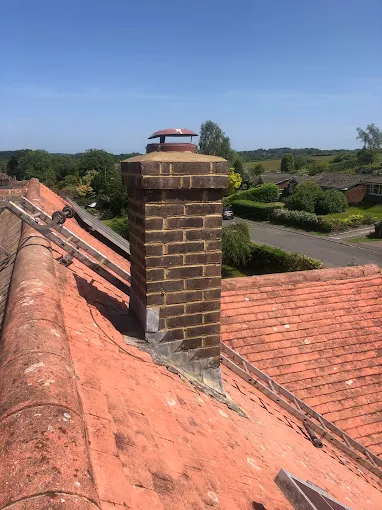 Rebuilt chimney stack with new lead tray and cowl
