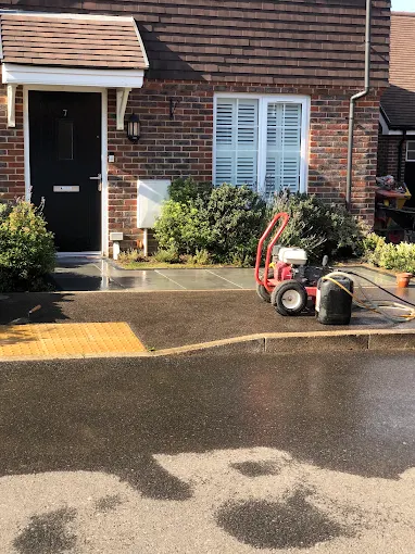 Driveway jet washing outside a Sussex home