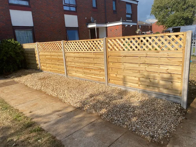 New timber fencing with decorative trellis top